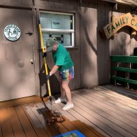 Michele painting the deck